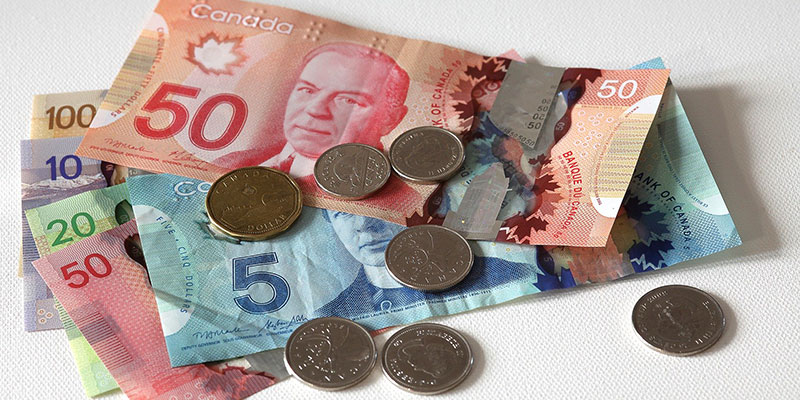 An assortment of Canadian money in bills and coins