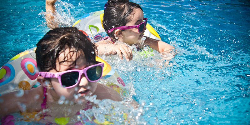 Photo of kids in the pool with sparkling water