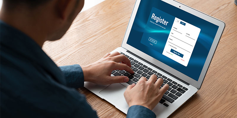 Person using computer to register for something