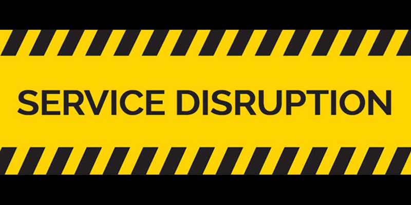 Black and yellow striped image with the words service disruption on it.