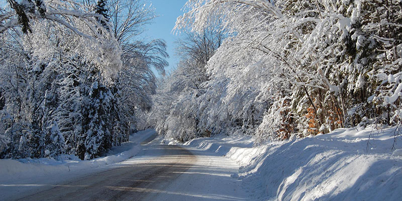 A freshly plowed and sanded road in Highlands East.