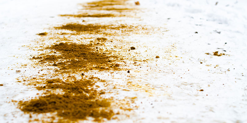 Sand spread out on a walkway.